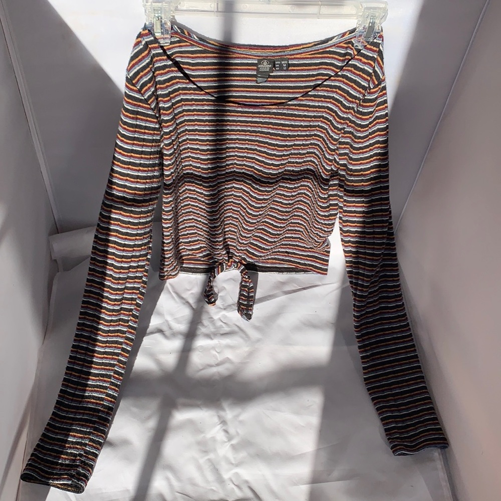 Medium volcom shirt. Great condition. Striped and long sleeve. Tie at bottom